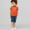 Copalo Boys' Pumpkin Orange Short Sleeve Polo with Exclusive Jungle Print